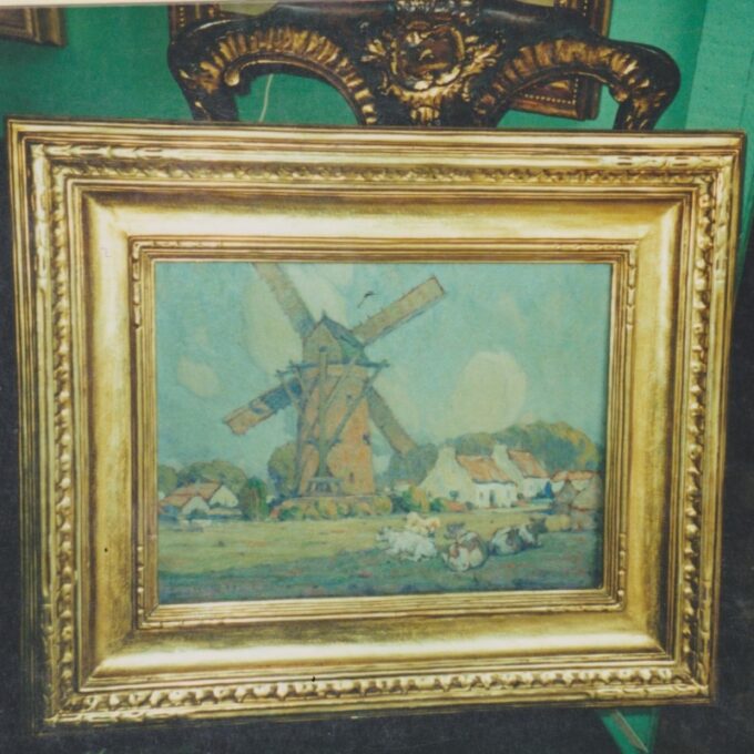 Cows Resting Beside A Wind Mill - Image 2