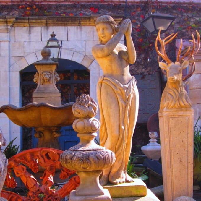 Set Of Three Art Deco Stone Statues Depicting Maidens Playing Musical Instruments