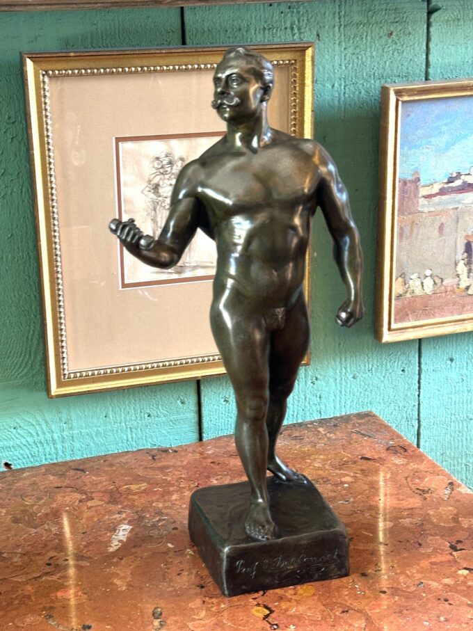 A French Patinated Metal Model Body Builder After A Model By Rene Paris